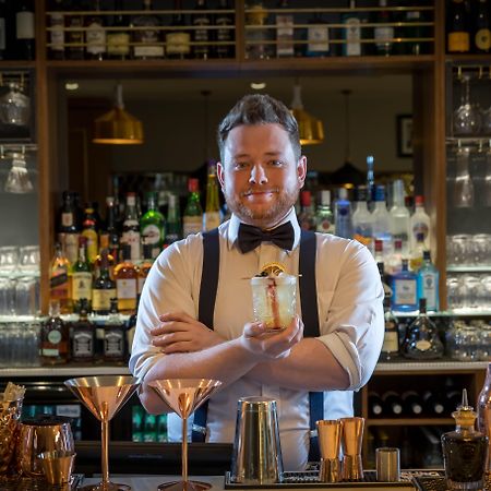 Clayton Hotel Dublin Airport Coolock Dış mekan fotoğraf Bartender with a drink